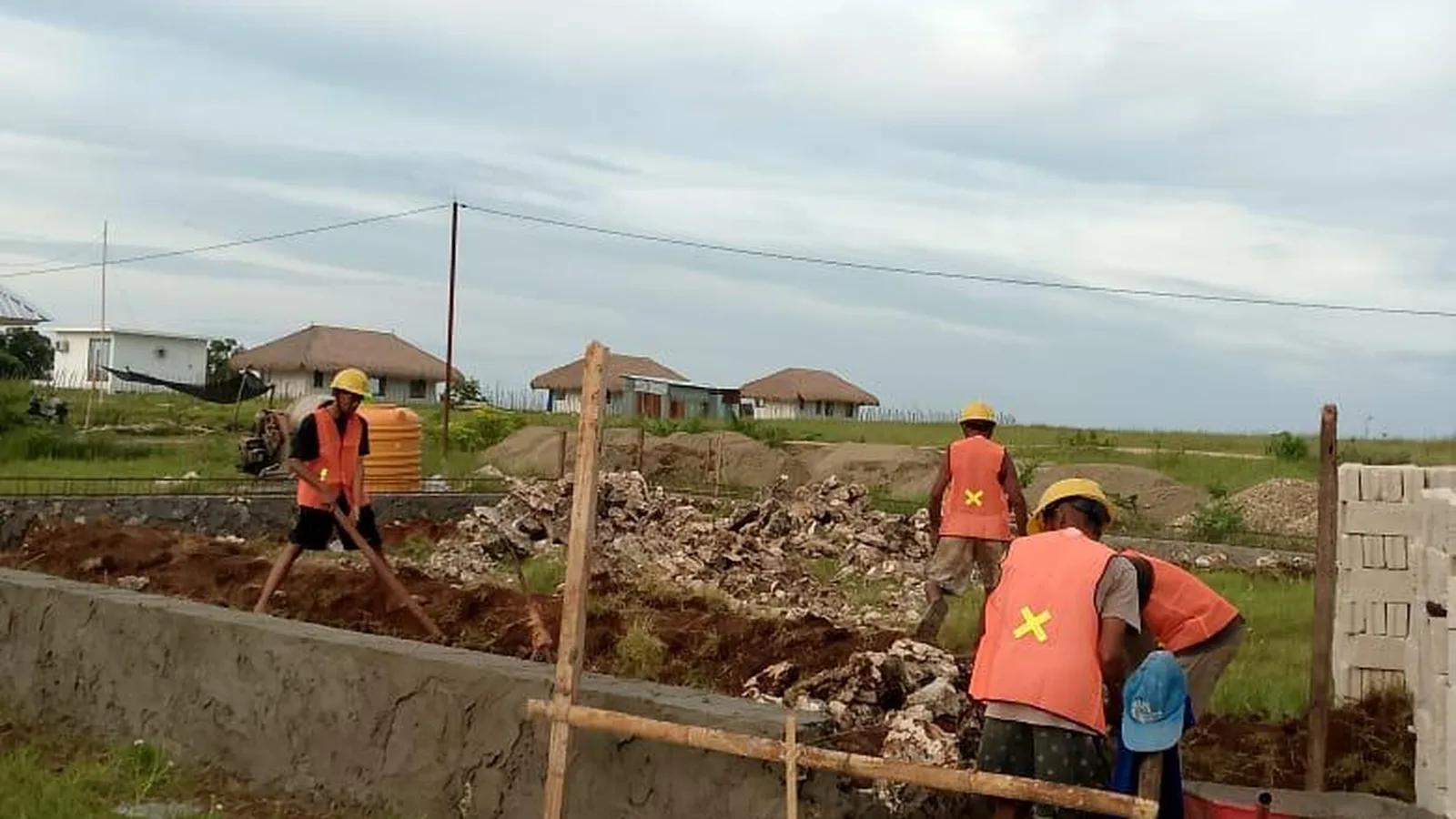 Construction workers on site at Eco Beach City